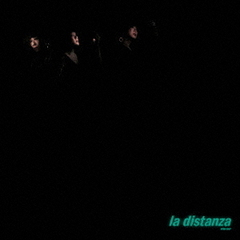 la　distanza